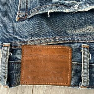 Levi's Relaxed Fit Blue Jeans with Brown Patch